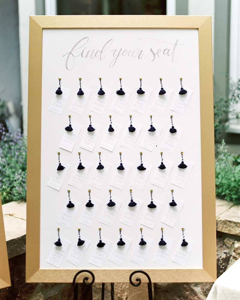 find your seat seating chart tassel escort cards gray calligraphy